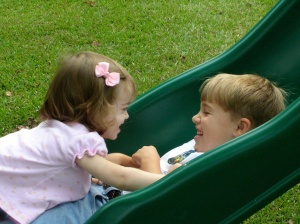 My children playing in our new yard on the first day in our new home.  They were 4 1/2 and 18 months.
