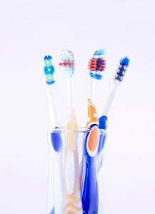 Toothbrushes on a glass